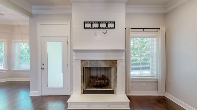 174 Ridgecrest Loop, Dothan, AL 36301 - detailed view of wood finished floors, ornamental molding, baseboards, and a fireplace with raised hearth