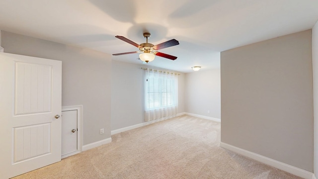 174 Ridgecrest Loop, Dothan, AL 36301 - unfurnished room with light colored carpet, a ceiling fan, and baseboards