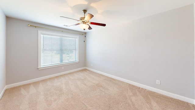 174 Ridgecrest Loop, Dothan, AL 36301 - empty room featuring light colored carpet, baseboards, and a ceiling fan