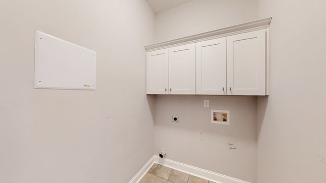 174 Ridgecrest Loop, Dothan, AL 36301 - laundry room with baseboards, cabinet space, hookup for an electric dryer, washer hookup, and light tile patterned flooring