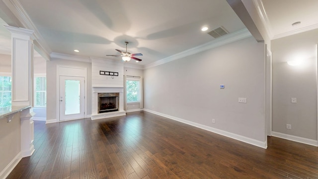 174 Ridgecrest Loop, Dothan, AL 36301 - unfurnished living room featuring ceiling fan, dark wood finished floors, a fireplace with raised hearth, baseboards, and recessed lighting