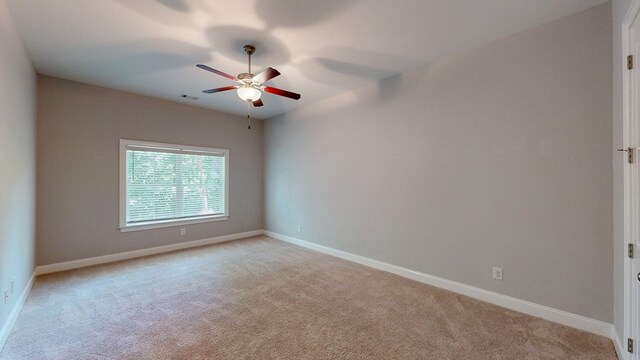 174 Ridgecrest Loop, Dothan, AL 36301 - empty room featuring light carpet, a ceiling fan, and baseboards