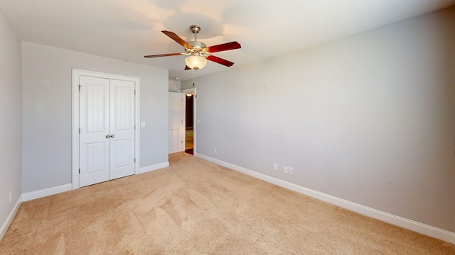 174 Ridgecrest Loop, Dothan, AL 36301 - unfurnished bedroom with carpet, a closet, baseboards, and ceiling fan