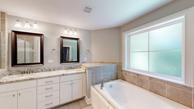 174 Ridgecrest Loop, Dothan, AL 36301 - full bath featuring a bath, double vanity, tile patterned floors, and tiled shower
