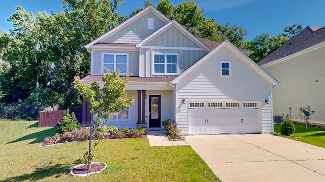 174 Ridgecrest Loop, Dothan, AL 36301 - craftsman inspired home featuring board and batten siding, concrete driveway, a garage, covered porch, and central AC unit
