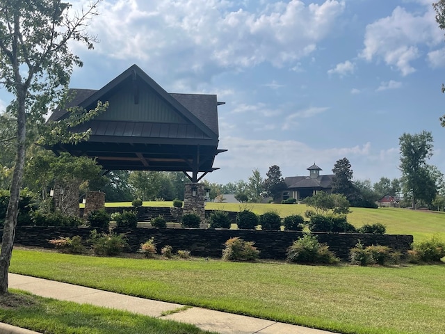 view of community featuring a yard