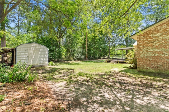 700 S Lakeview, Dothan, AL 36301 - view of green lawn with a shed and an outdoor structure