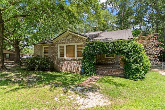700 S Lakeview, Dothan, AL 36301 - view of front facade with brick siding and metal roof