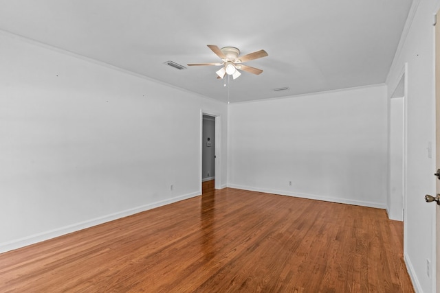 700 S Lakeview, Dothan, AL 36301 - empty room featuring ceiling fan, wood finished floors, crown molding, and baseboards