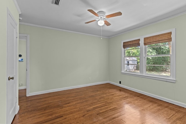 700 S Lakeview, Dothan, AL 36301 - empty room with ceiling fan, wood finished floors, ornamental molding, and baseboards