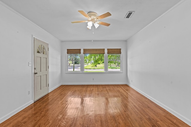 700 S Lakeview, Dothan, AL 36301 - empty room with wood finished floors, ceiling fan, and baseboards
