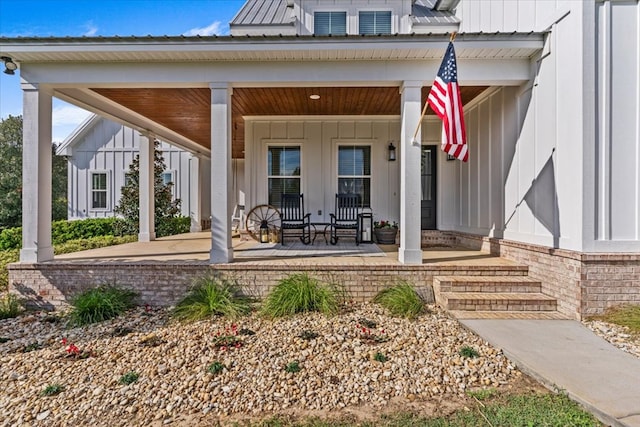 entrance to property with covered porch