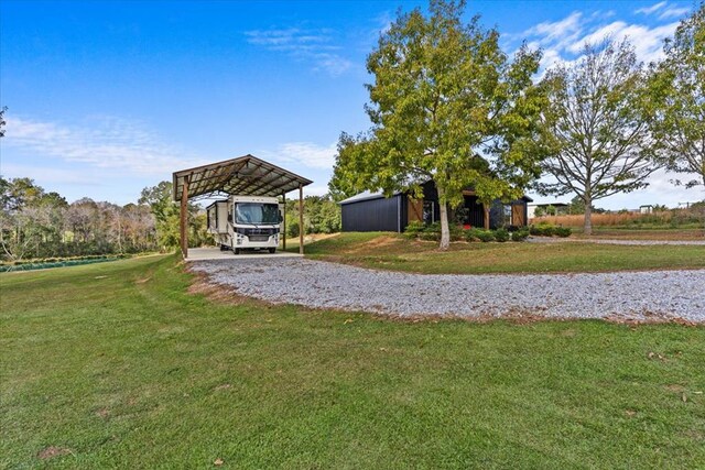 view of yard with a carport