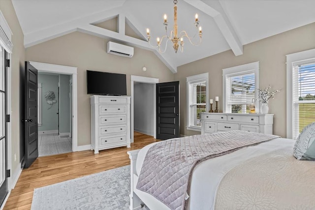 bedroom featuring lofted ceiling with beams, an AC wall unit, an inviting chandelier, and light hardwood / wood-style floors