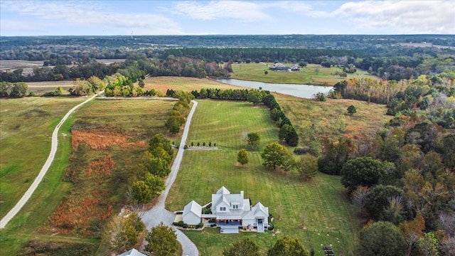 drone / aerial view with a water view and a rural view