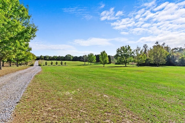 exterior space with a yard and a rural view