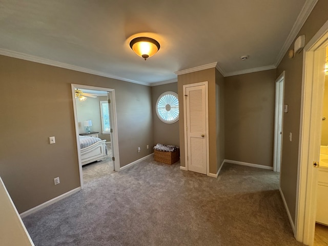 unfurnished bedroom with carpet floors and ornamental molding