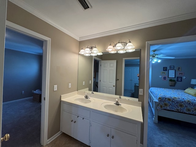 bathroom with vanity, ceiling fan, and crown molding