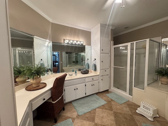 bathroom with crown molding, vanity, and a shower with shower door