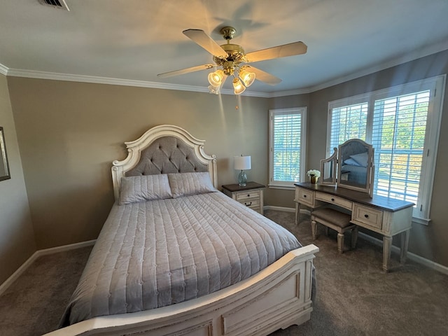 bedroom featuring dark colored carpet, ceiling fan, and ornamental molding