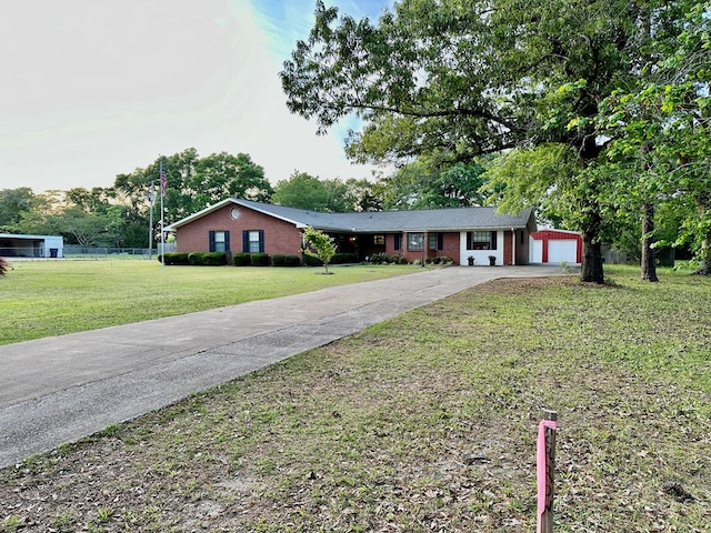 ranch-style home featuring a front yard