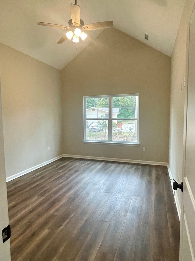 unfurnished room with dark hardwood / wood-style flooring, ceiling fan, and lofted ceiling