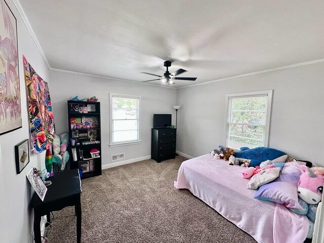 305 Highland Ave, Ozark, AL 36360 - bedroom featuring crown molding, multiple windows, carpet flooring, baseboards, and ceiling fan