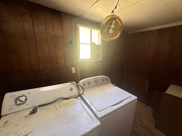 7 November Rd, Ashford, AL 36312 - washroom featuring separate washer and dryer and wood walls