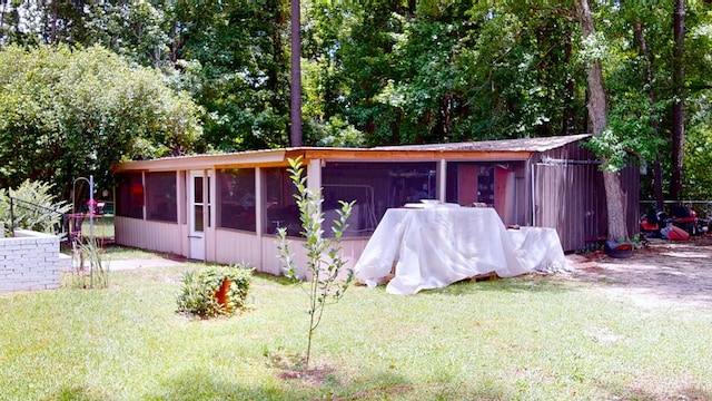 391 Hatton Rd, Dothan, AL 36301 - view of outdoor structure featuring a sunroom