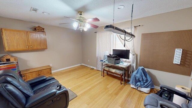 391 Hatton Rd, Dothan, AL 36301 - living area with a ceiling fan and light wood-style floors