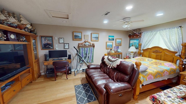 391 Hatton Rd, Dothan, AL 36301 - bedroom featuring light wood-style flooring, a desk, attic access, recessed lighting, and ceiling fan