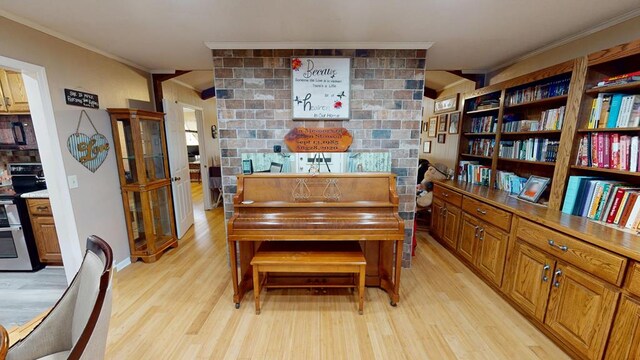 391 Hatton Rd, Dothan, AL 36301 - dining area with crown molding and light wood-style flooring