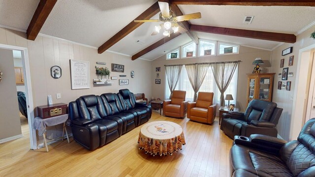 391 Hatton Rd, Dothan, AL 36301 - living area with light wood finished floors, a ceiling fan, and a textured ceiling