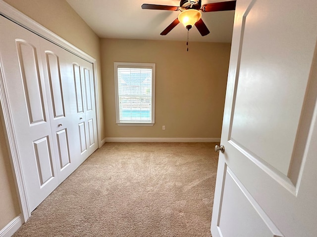 202 Frisco Ln, Enterprise, AL 36330 - unfurnished bedroom with baseboards, a closet, and light colored carpet