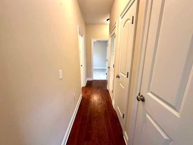 202 Frisco Ln, Enterprise, AL 36330 - hallway featuring baseboards and dark wood-style floors
