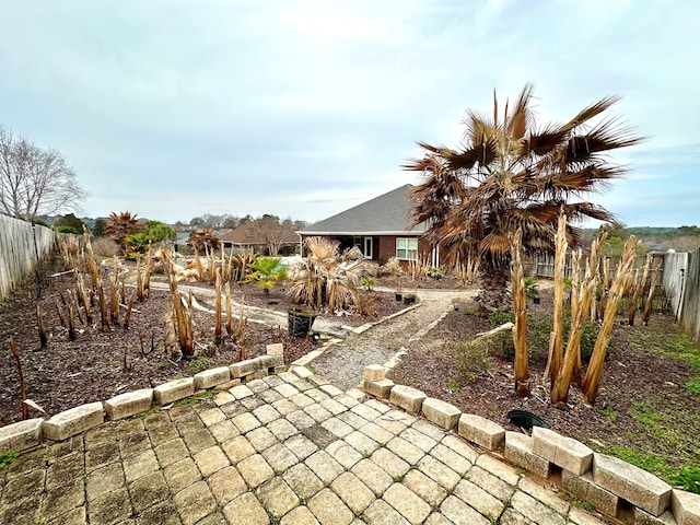 202 Frisco Ln, Enterprise, AL 36330 - view of yard featuring a patio and fence private yard