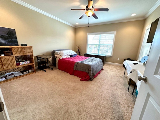 carpeted bedroom featuring crown molding and ceiling fan