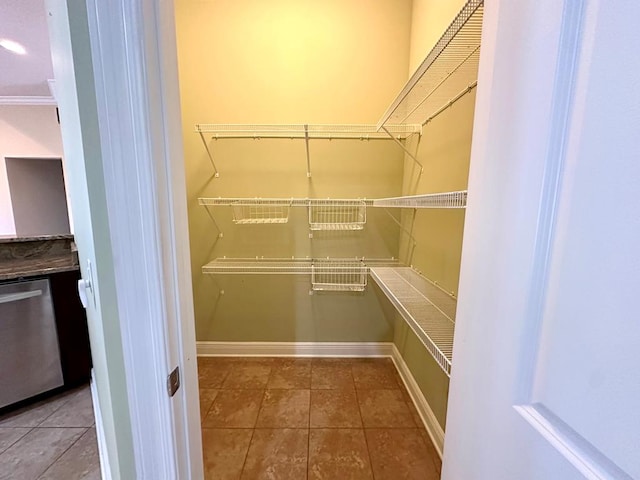 202 Frisco Ln, Enterprise, AL 36330 - walk in closet featuring tile patterned floors