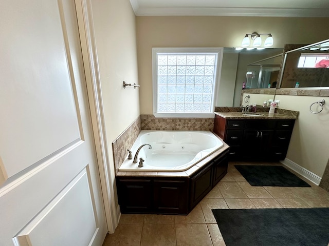 202 Frisco Ln, Enterprise, AL 36330 - full bathroom with crown molding, a shower stall, tile patterned floors, vanity, and a whirlpool tub