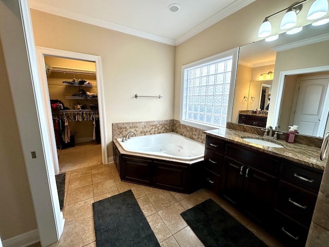 202 Frisco Ln, Enterprise, AL 36330 - full bathroom featuring vanity, ornamental molding, tile patterned floors, and a jetted tub