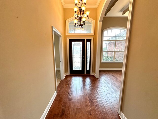 202 Frisco Ln, Enterprise, AL 36330 - entryway featuring crown molding, baseboards, a notable chandelier, and dark wood-style floors