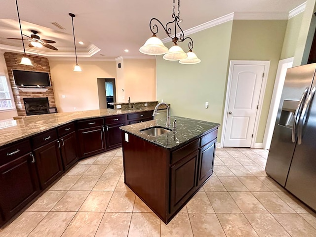 202 Frisco Ln, Enterprise, AL 36330 - kitchen featuring stainless steel fridge, a sink, ceiling fan, and light tile patterned floors