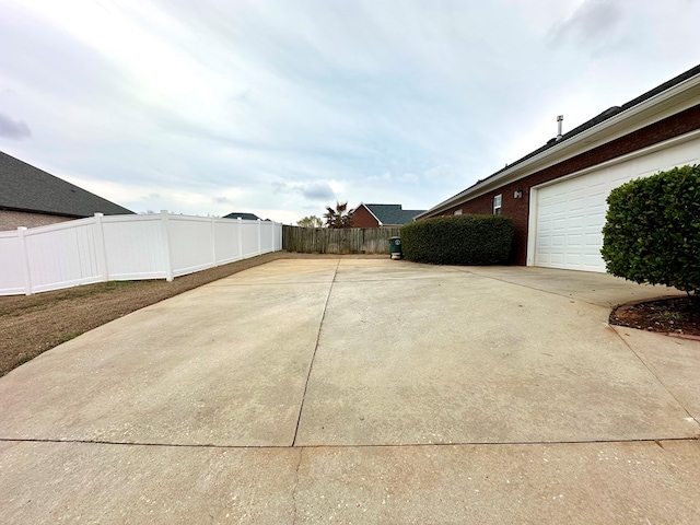 202 Frisco Ln, Enterprise, AL 36330 - exterior space featuring fence and driveway