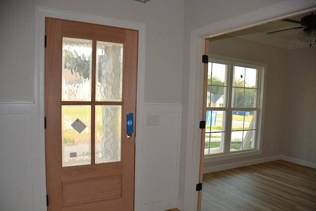 110 Mikala Ct, Enterprise, AL 36330 - entryway featuring crown molding, a ceiling fan, healthy amount of natural light, and wood finished floors