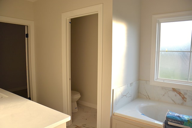 110 Mikala Ct, Enterprise, AL 36330 - bathroom with a bath, marble finish flooring, and vanity