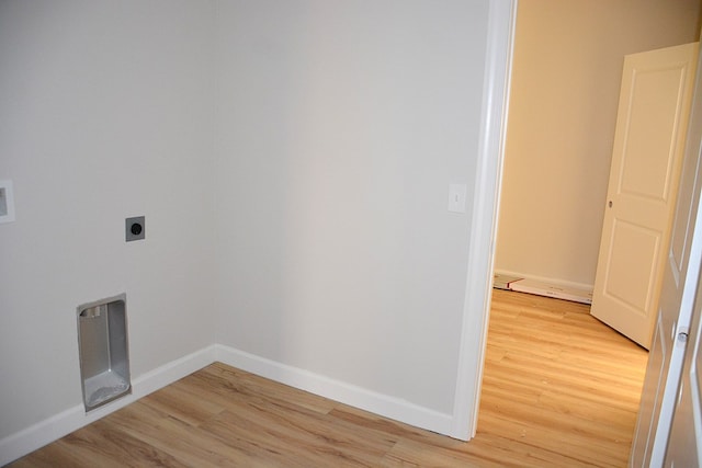 110 Mikala Ct, Enterprise, AL 36330 - washroom with electric dryer hookup and light wood-style flooring