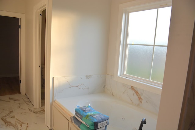 110 Mikala Ct, Enterprise, AL 36330 - bathroom with a whirlpool tub and marble finish floors
