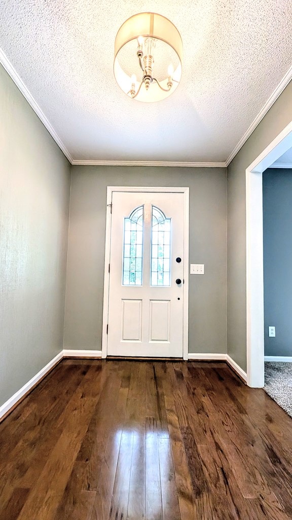 5 Walford Pl, Dothan, AL 36301 - foyer with hardwood / wood-style floors, crown molding, a textured ceiling, and a chandelier