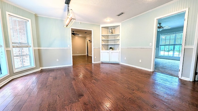 5 Walford Pl, Dothan, AL 36301 - spare room featuring a ceiling fan, crown molding, built in features, wood finished floors, and a textured ceiling