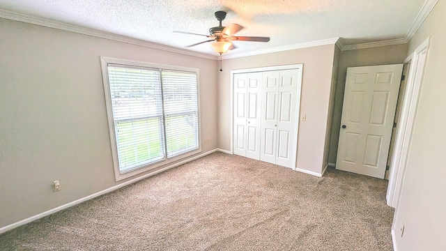 5 Walford Pl, Dothan, AL 36301 - unfurnished bedroom with carpet flooring, a textured ceiling, a closet, ornamental molding, and a ceiling fan